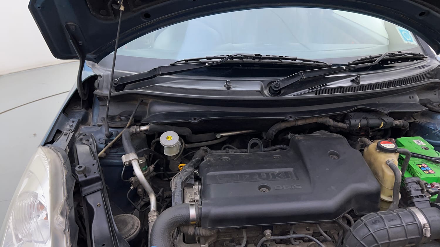 Used 2012 Maruti Suzuki Swift Dzire VDI Diesel Manual engine ENGINE RIGHT SIDE HINGE & APRON VIEW