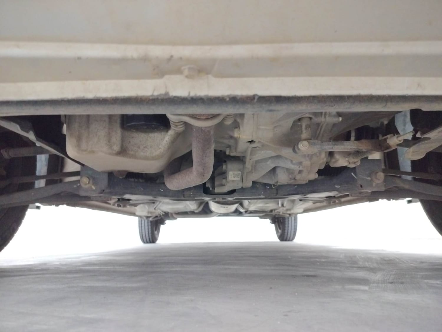 Used 2023 Maruti Suzuki Alto K10 VXI Plus Petrol Manual extra FRONT LEFT UNDERBODY VIEW