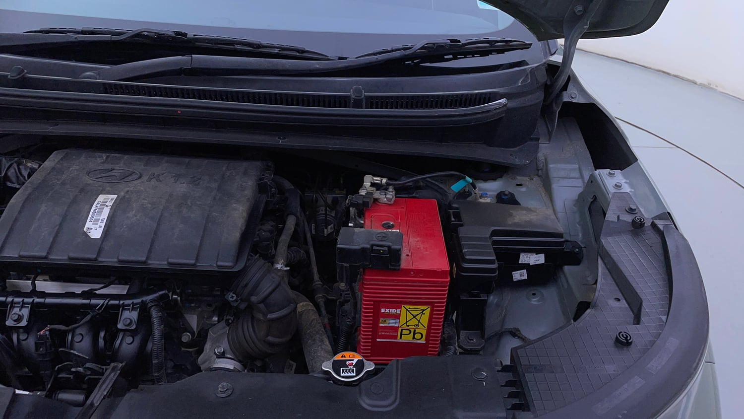 Used 2023 Hyundai Exter SX(O) Connect 1.2 Petrol MT Dual Tone Petrol Manual engine ENGINE LEFT SIDE HINGE & APRON VIEW