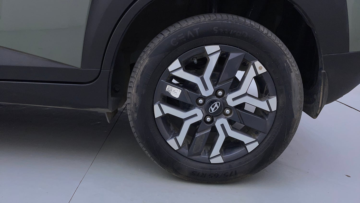 Used 2023 Hyundai Exter SX(O) Connect 1.2 Petrol MT Dual Tone Petrol Manual tyres LEFT REAR TYRE RIM VIEW