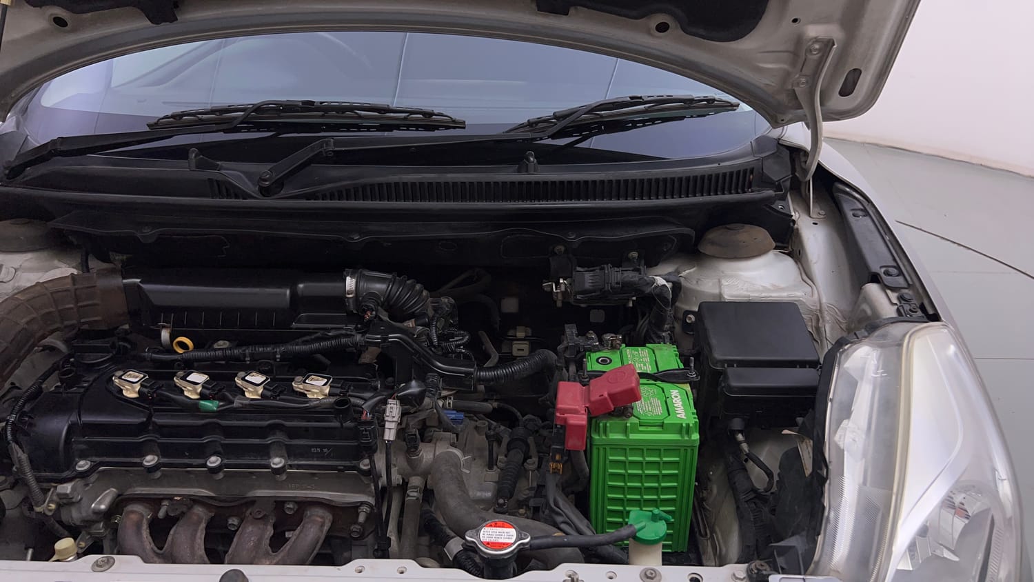 Used 2016 Maruti Suzuki Baleno Zeta AT Petrol Petrol Automatic engine ENGINE LEFT SIDE HINGE & APRON VIEW