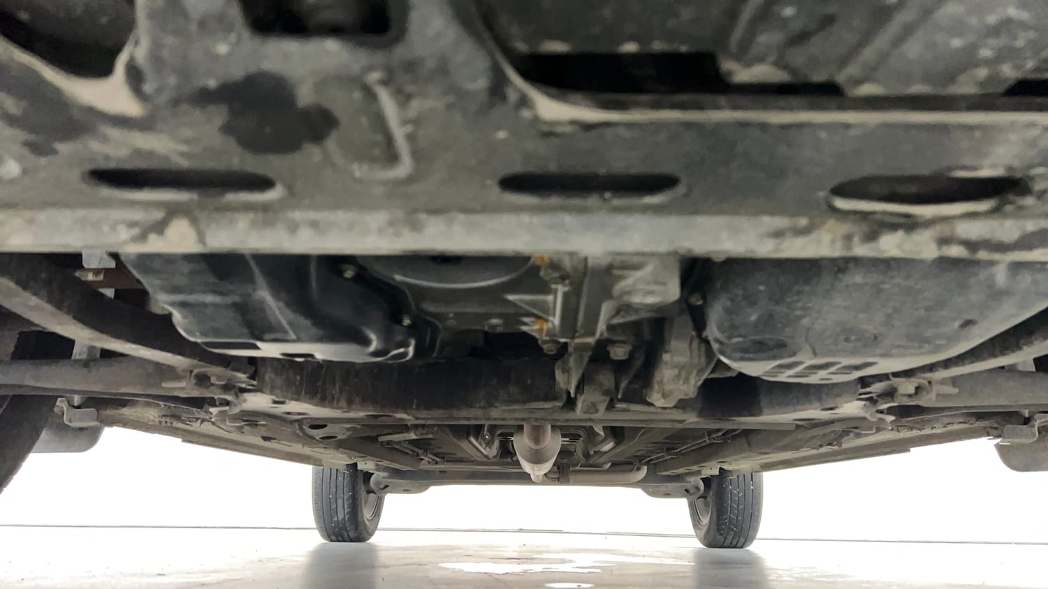 Used 2021 Nissan Magnite XV Premium Turbo CVT (O) Dual Tone Petrol Automatic extra FRONT LEFT UNDERBODY VIEW