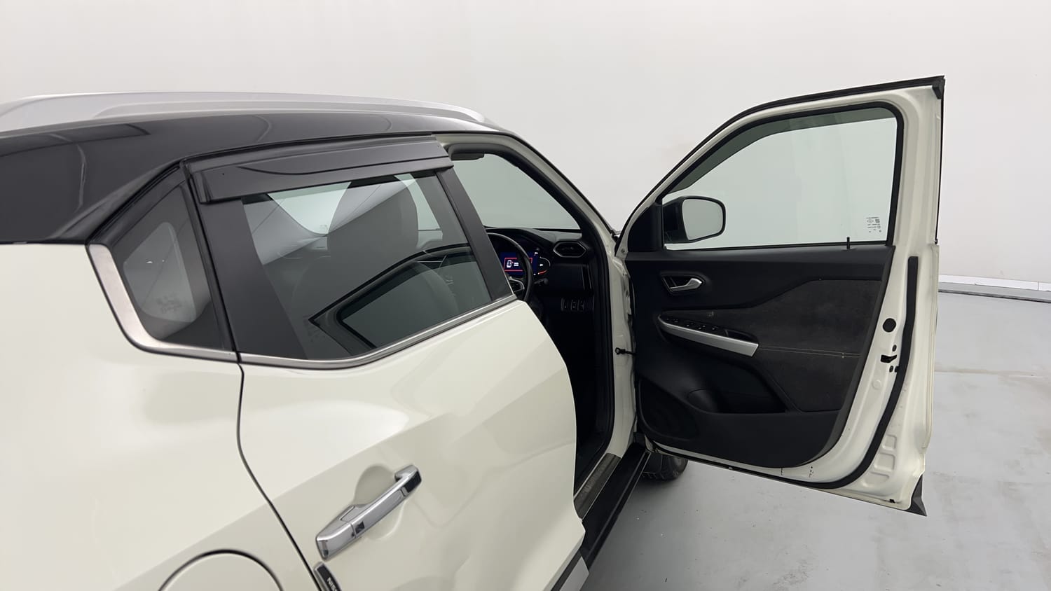 Used 2021 Nissan Magnite XV Premium Turbo CVT (O) Dual Tone Petrol Automatic interior RIGHT FRONT DOOR OPEN VIEW