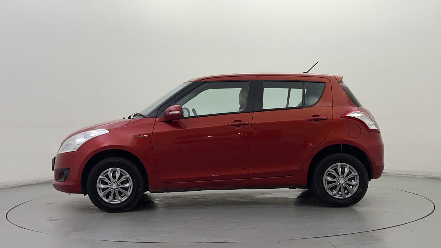 Used 2013 Maruti Suzuki Swift VXI Petrol Manual exterior LEFT SIDE VIEW