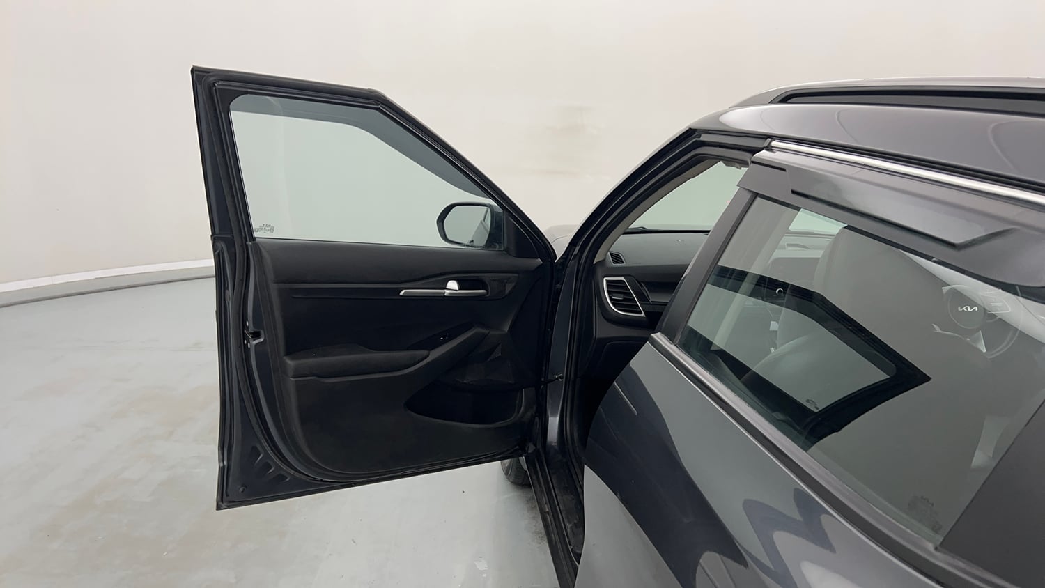 Used 2023 Kia Seltos HTK Plus 1.5 Turbo Petrol iMT Petrol Manual interior LEFT FRONT DOOR OPEN VIEW