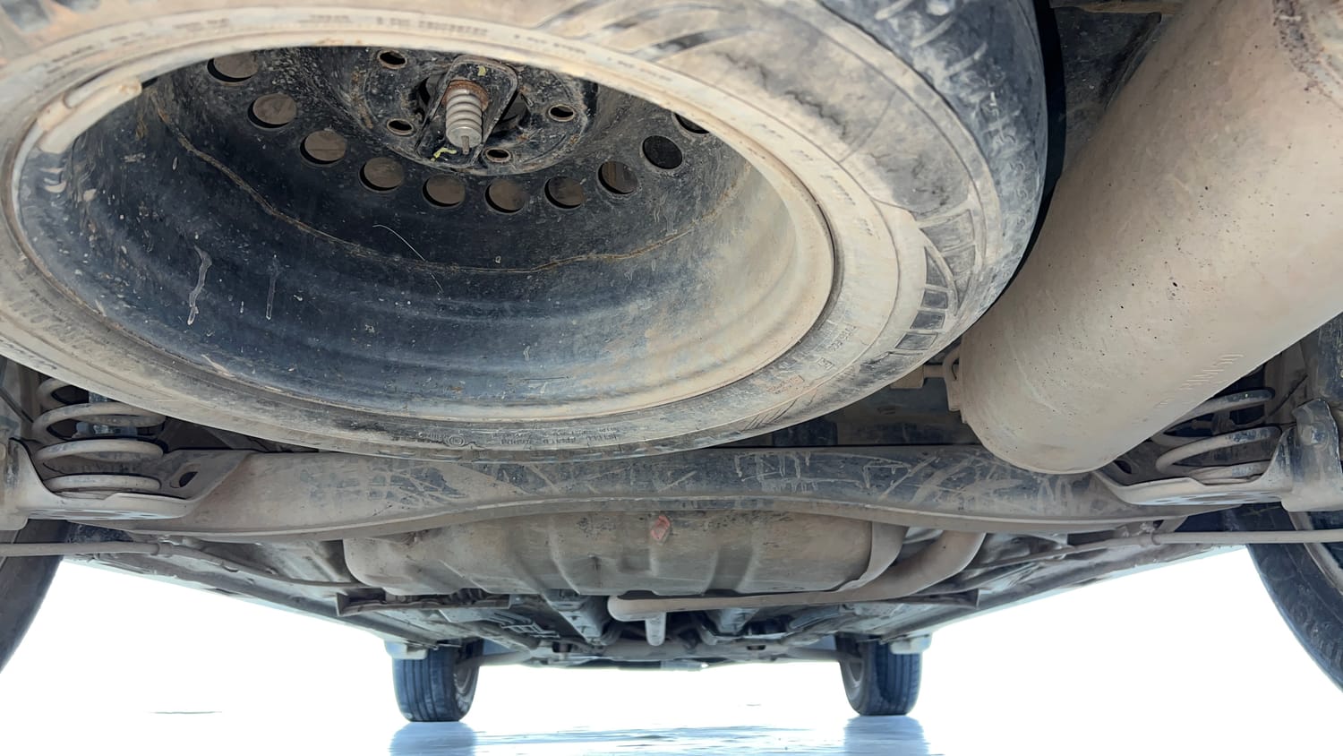 Used 2023 Kia Carens Prestige Plus 1.5 Diesel MT 7 STR Diesel Manual extra REAR UNDERBODY VIEW (TAKEN FROM REAR)