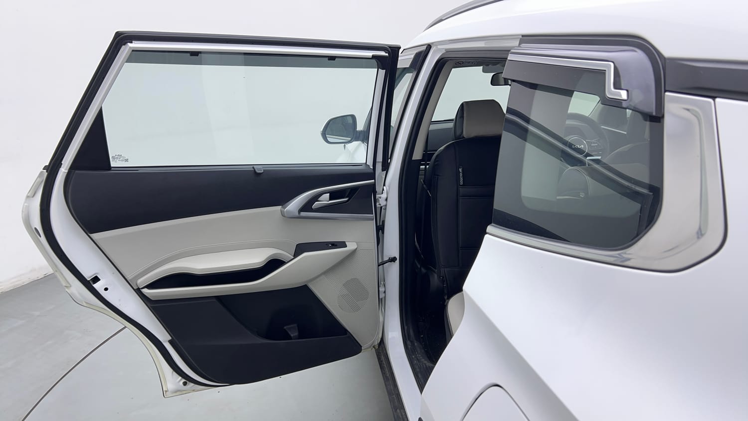 Used 2023 Kia Carens Prestige Plus 1.5 Diesel MT 7 STR Diesel Manual interior LEFT REAR DOOR OPEN VIEW