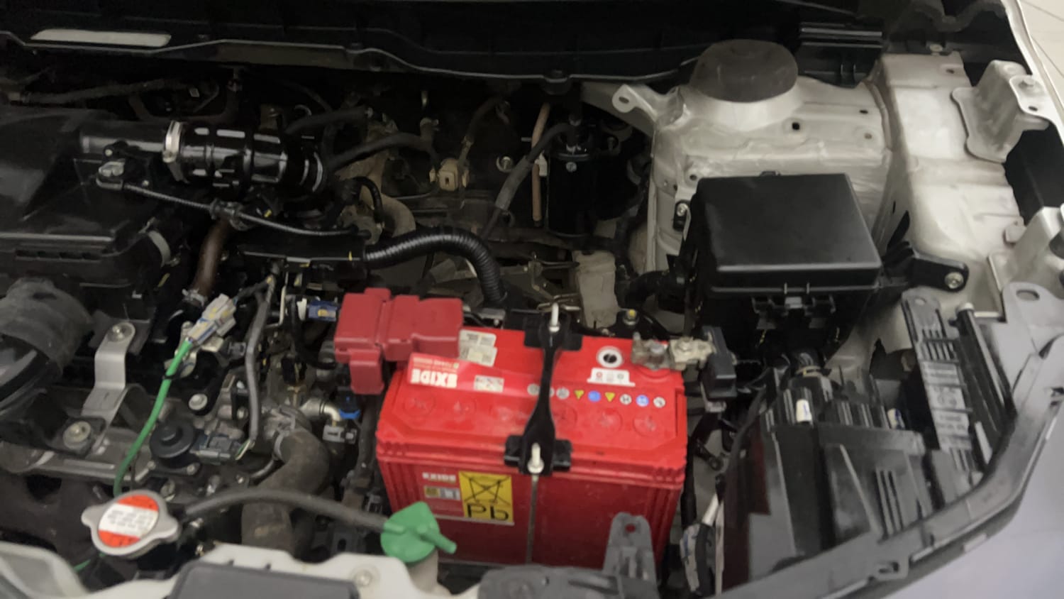 Used 2022 Maruti Suzuki Brezza Zxi Plus Dual Tone Petrol Manual engine ENGINE LEFT SIDE VIEW