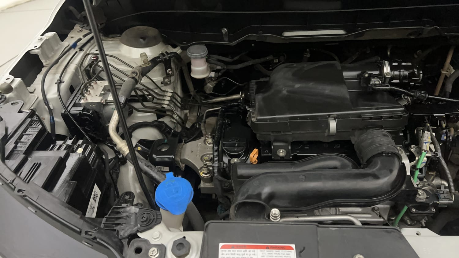 Used 2022 Maruti Suzuki Brezza Zxi Plus Dual Tone Petrol Manual engine ENGINE RIGHT SIDE VIEW