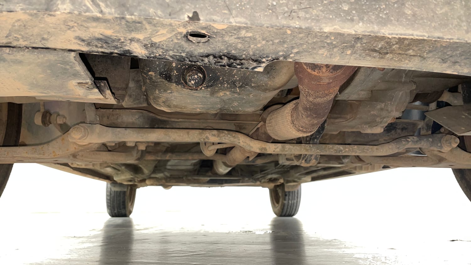 Used 2017 Tata Tiago Revotron XT Petrol Manual extra FRONT LEFT UNDERBODY VIEW