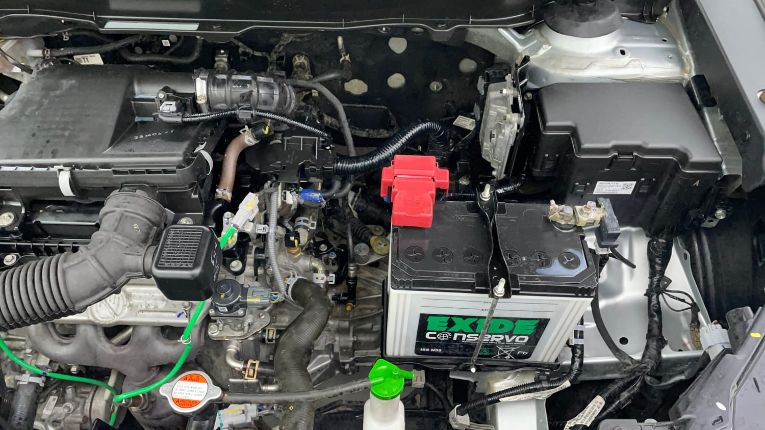 Used 2023 Maruti Suzuki Grand Vitara Alpha Smart Hybrid AllGrip Petrol Manual engine ENGINE LEFT SIDE VIEW