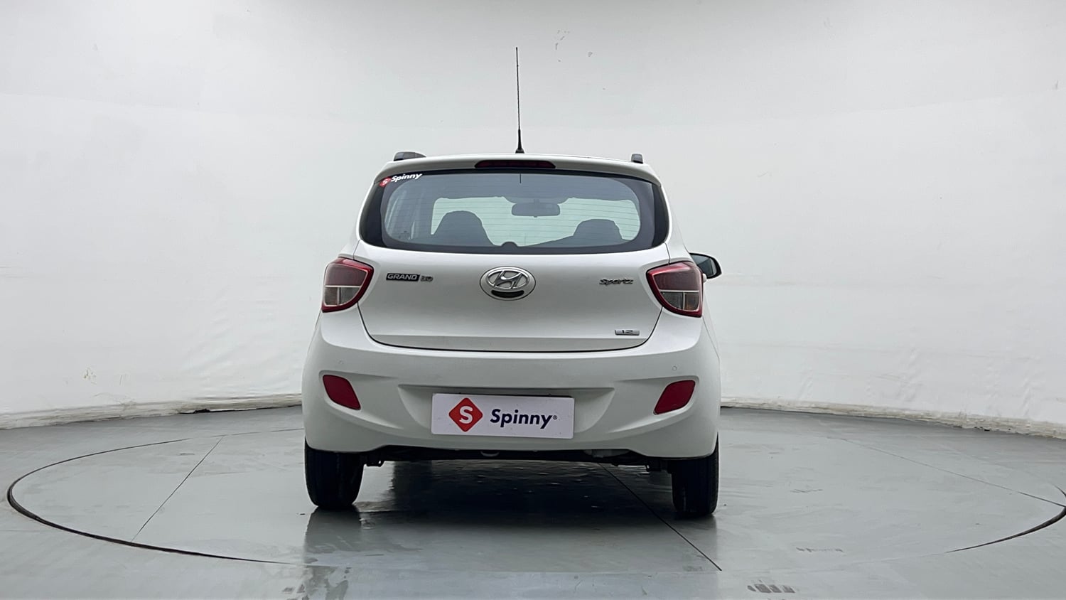 Used 2015 Hyundai Grand i10 Sportz 1.2 Kappa VTVT Petrol Manual exterior BACK VIEW
