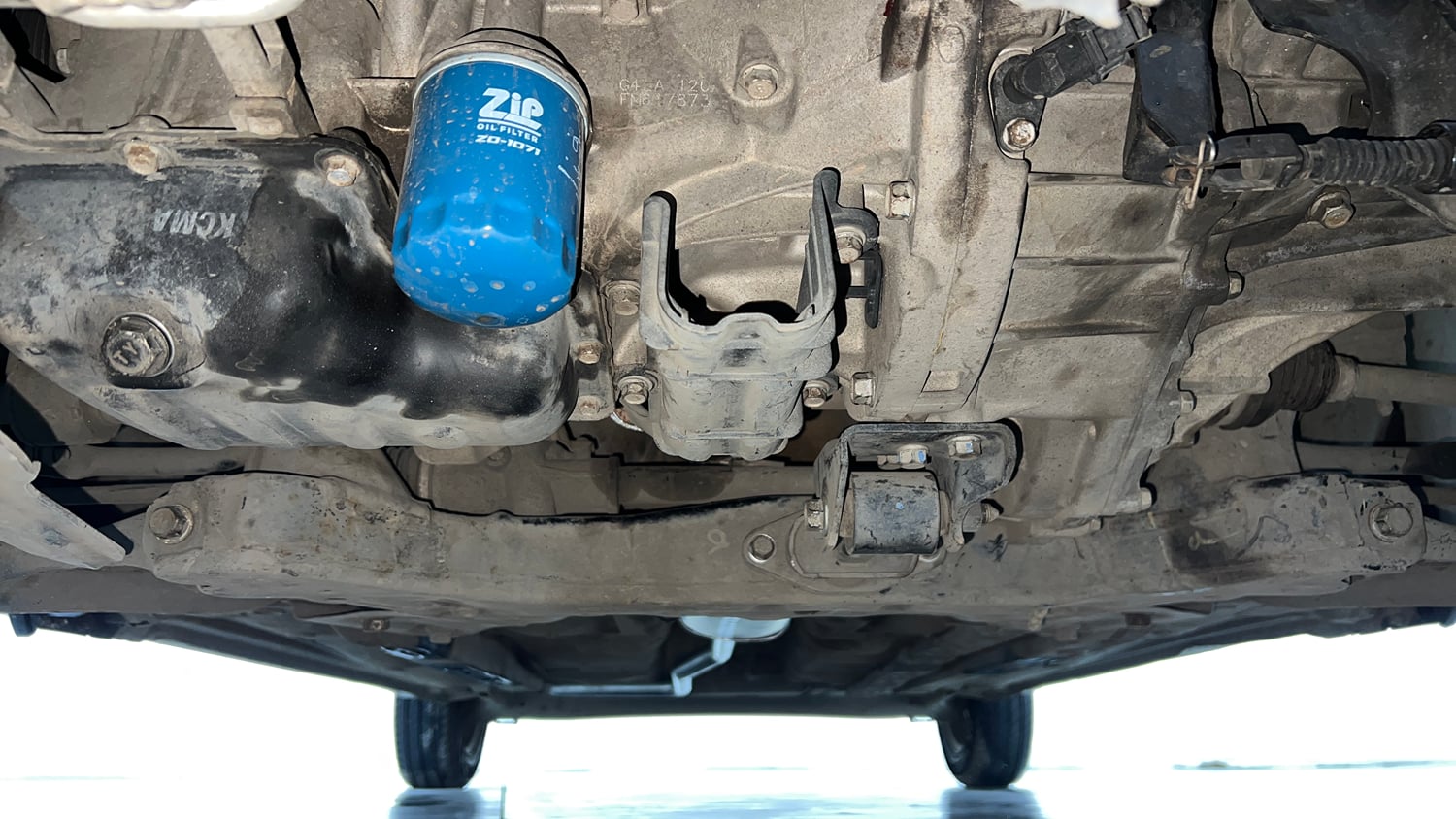 Used 2015 Hyundai Grand i10 Sportz 1.2 Kappa VTVT Petrol Manual extra FRONT LEFT UNDERBODY VIEW