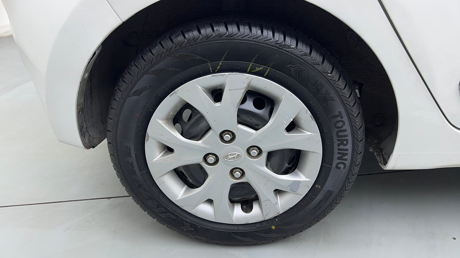 Used 2015 Hyundai Grand i10 Sportz 1.2 Kappa VTVT Petrol Manual tyres RIGHT REAR TYRE RIM VIEW