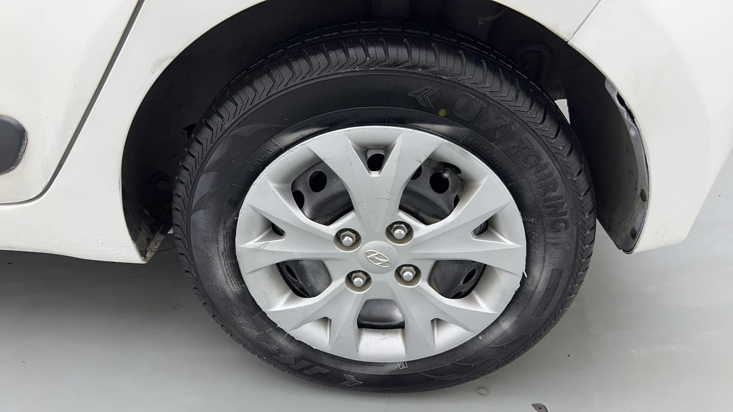 Used 2015 Hyundai Grand i10 Sportz 1.2 Kappa VTVT Petrol Manual tyres LEFT REAR TYRE RIM VIEW