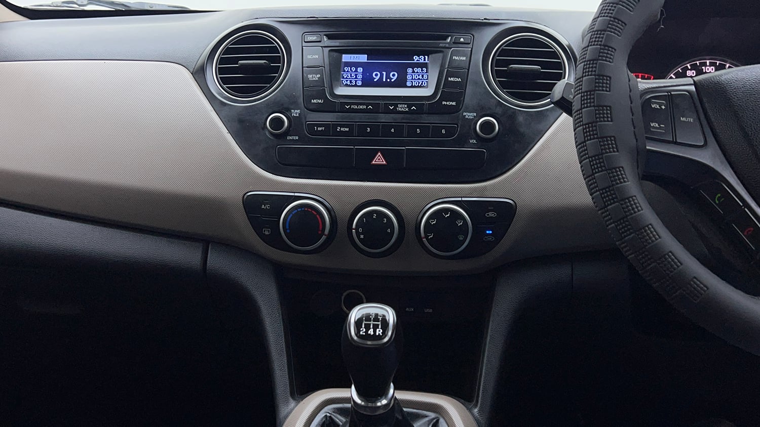 Used 2015 Hyundai Grand i10 Sportz 1.2 Kappa VTVT Petrol Manual interior MUSIC SYSTEM & AC CONTROL VIEW