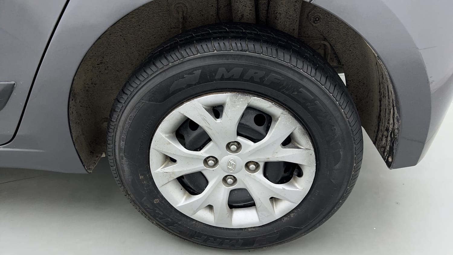 Used 2014 Hyundai Elite i20 Sportz 1.2 Petrol Manual tyres LEFT REAR TYRE RIM VIEW