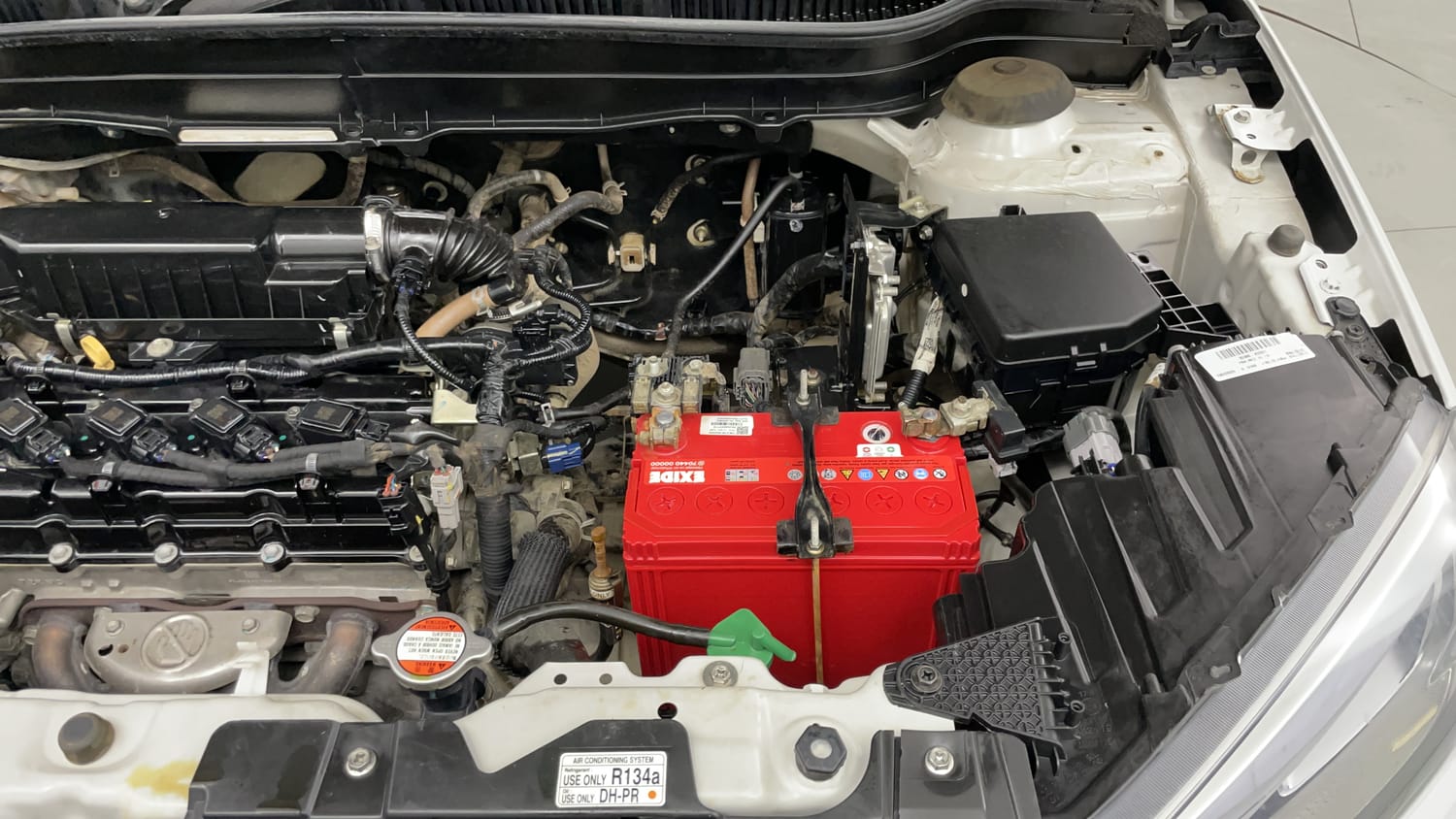 Used 2022 Maruti Suzuki Vitara Brezza ZXi AT SHVS Petrol Automatic engine ENGINE LEFT SIDE VIEW