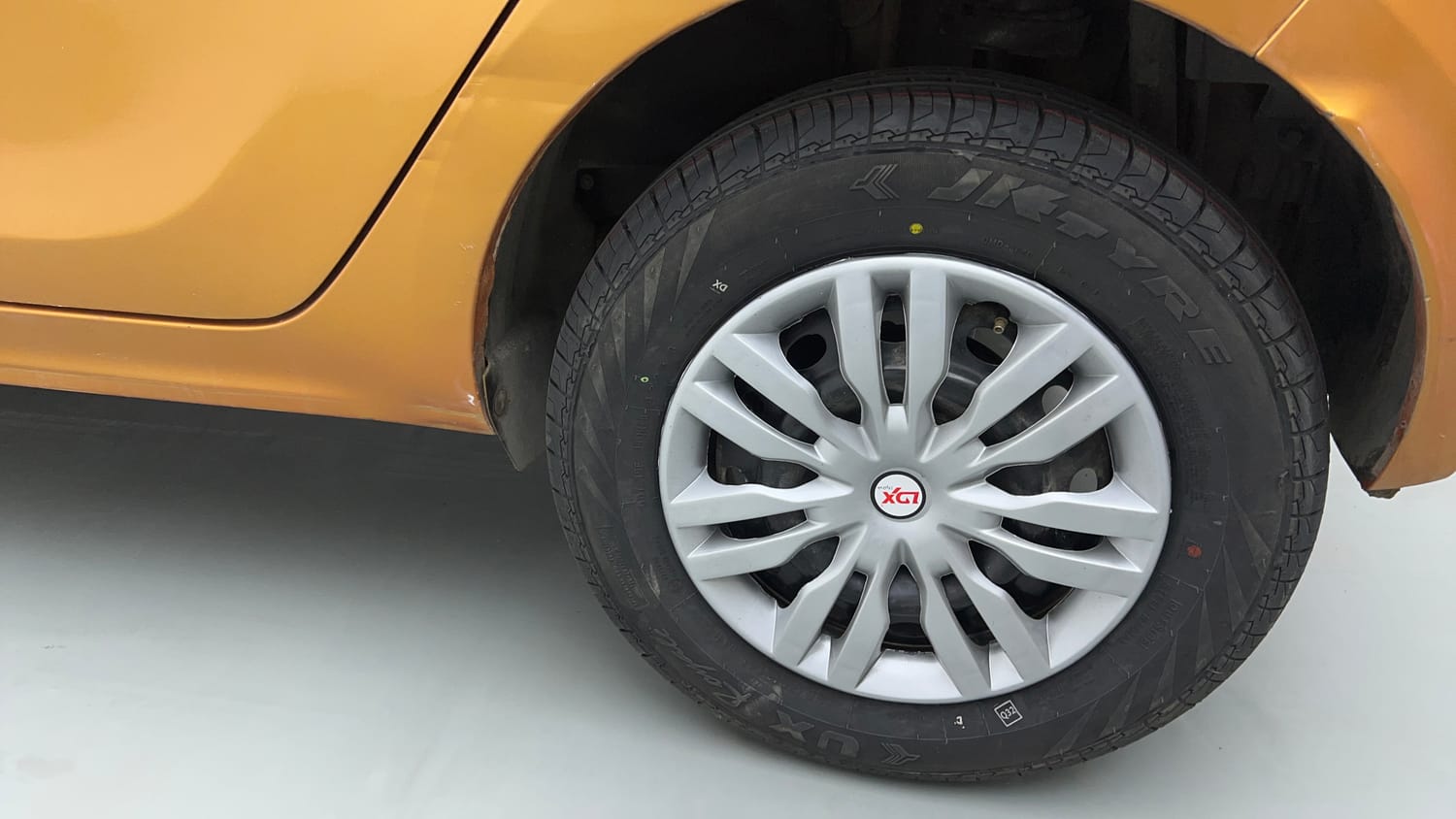 Used 2016 Tata Tiago Revotron XT Petrol Manual tyres LEFT REAR TYRE RIM VIEW