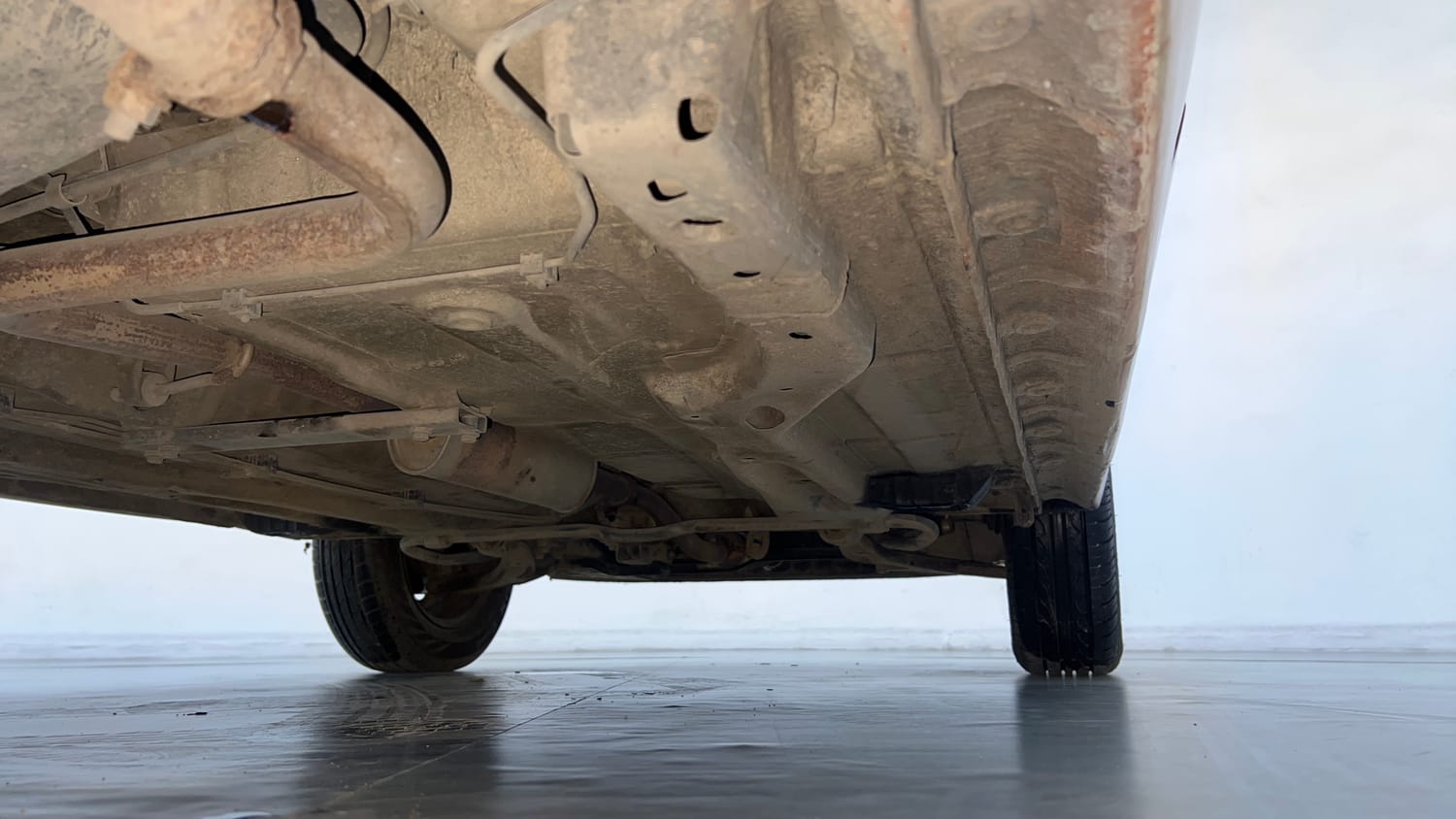 Used 2016 Tata Tiago Revotron XT Petrol Manual extra REAR RIGHT UNDERBODY VIEW