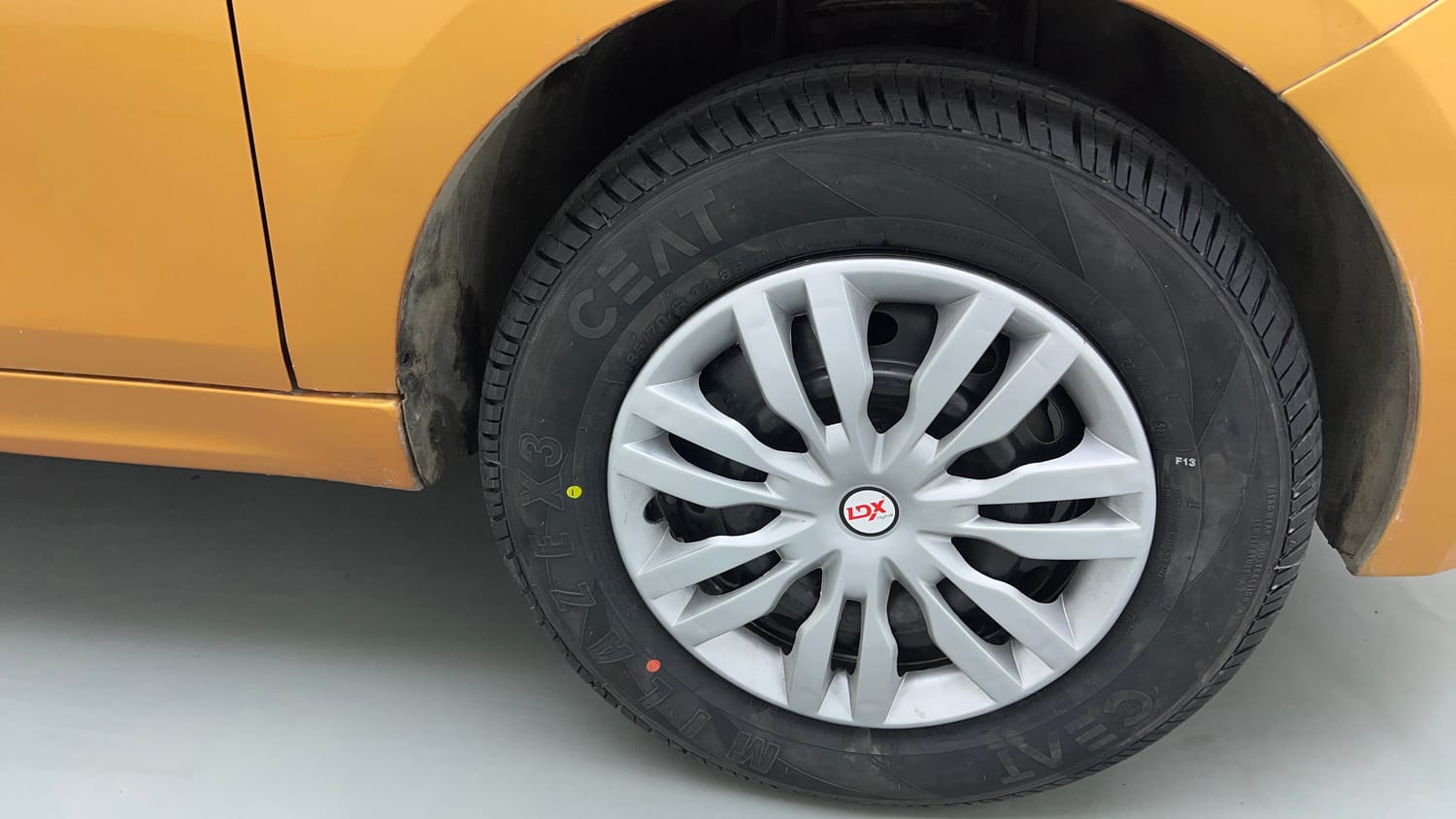 Used 2016 Tata Tiago Revotron XT Petrol Manual tyres RIGHT FRONT TYRE RIM VIEW