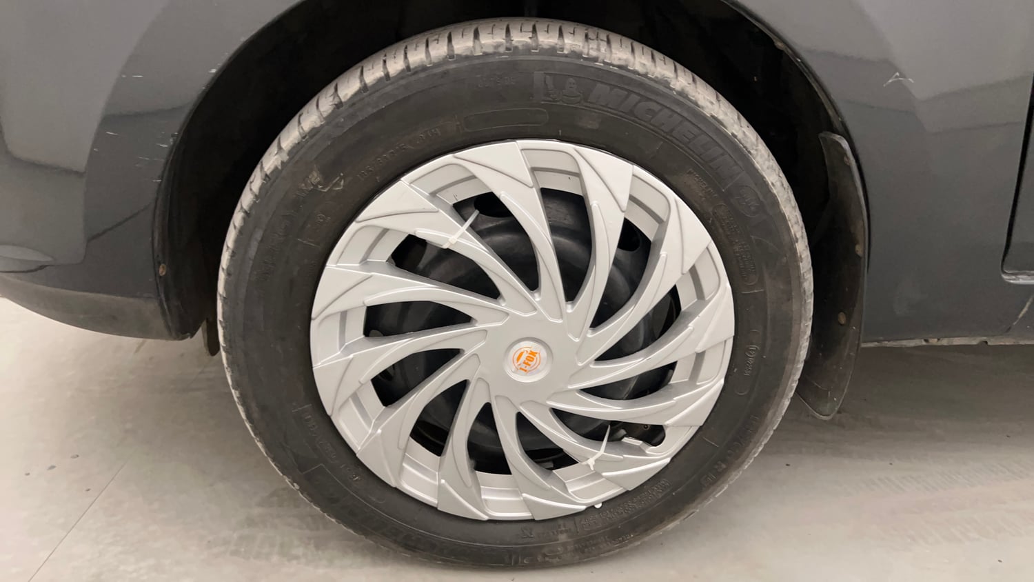 Used 2015 Tata Zest XMS Petrol Petrol Manual tyres LEFT FRONT TYRE RIM VIEW