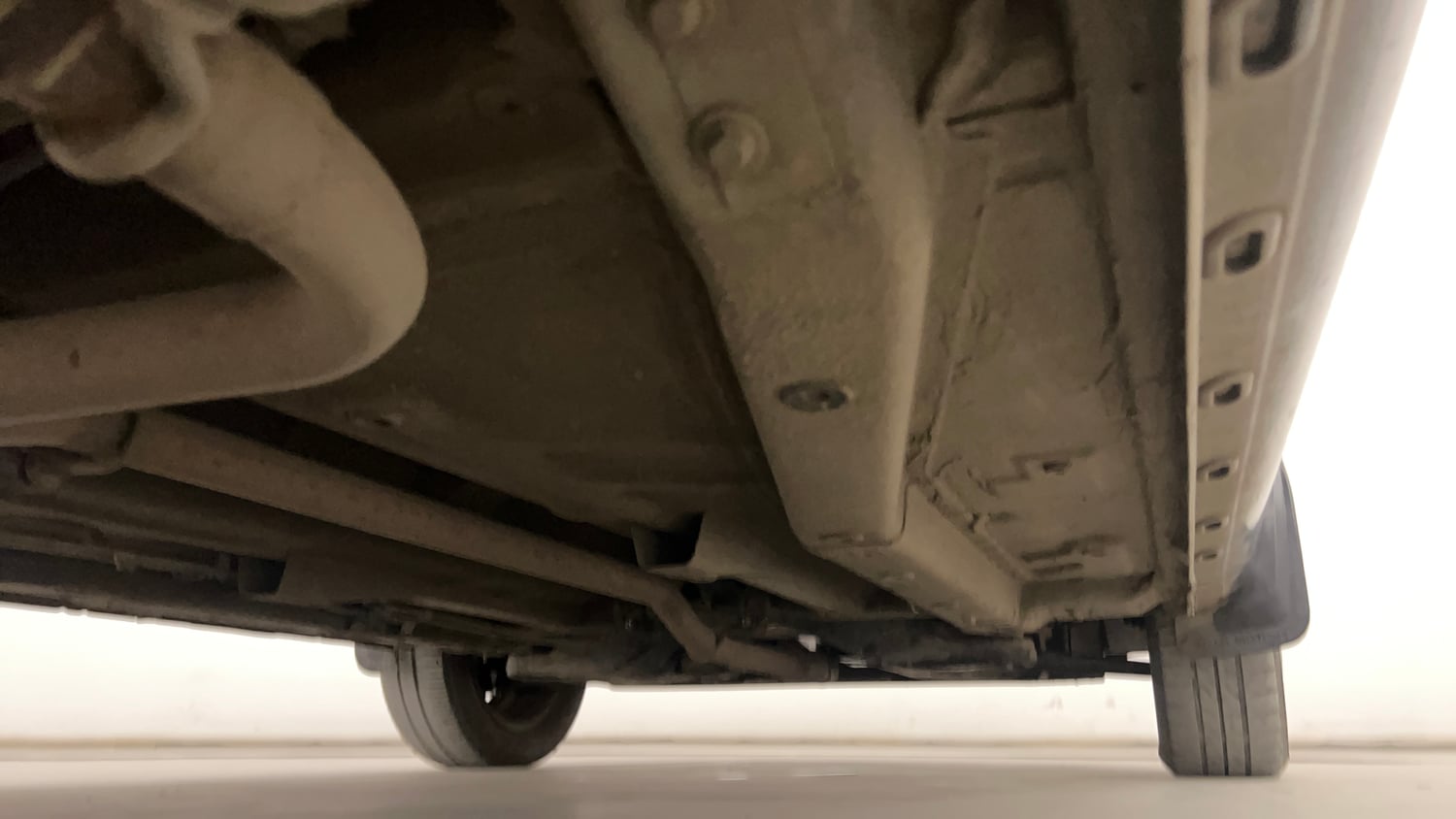Used 2015 Tata Zest XMS Petrol Petrol Manual extra REAR RIGHT UNDERBODY VIEW