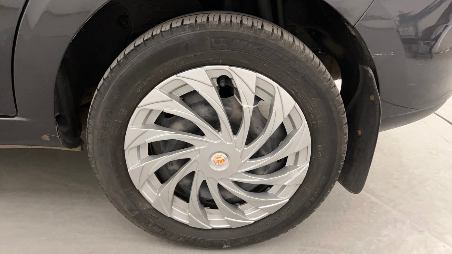Used 2015 Tata Zest XMS Petrol Petrol Manual tyres LEFT REAR TYRE RIM VIEW