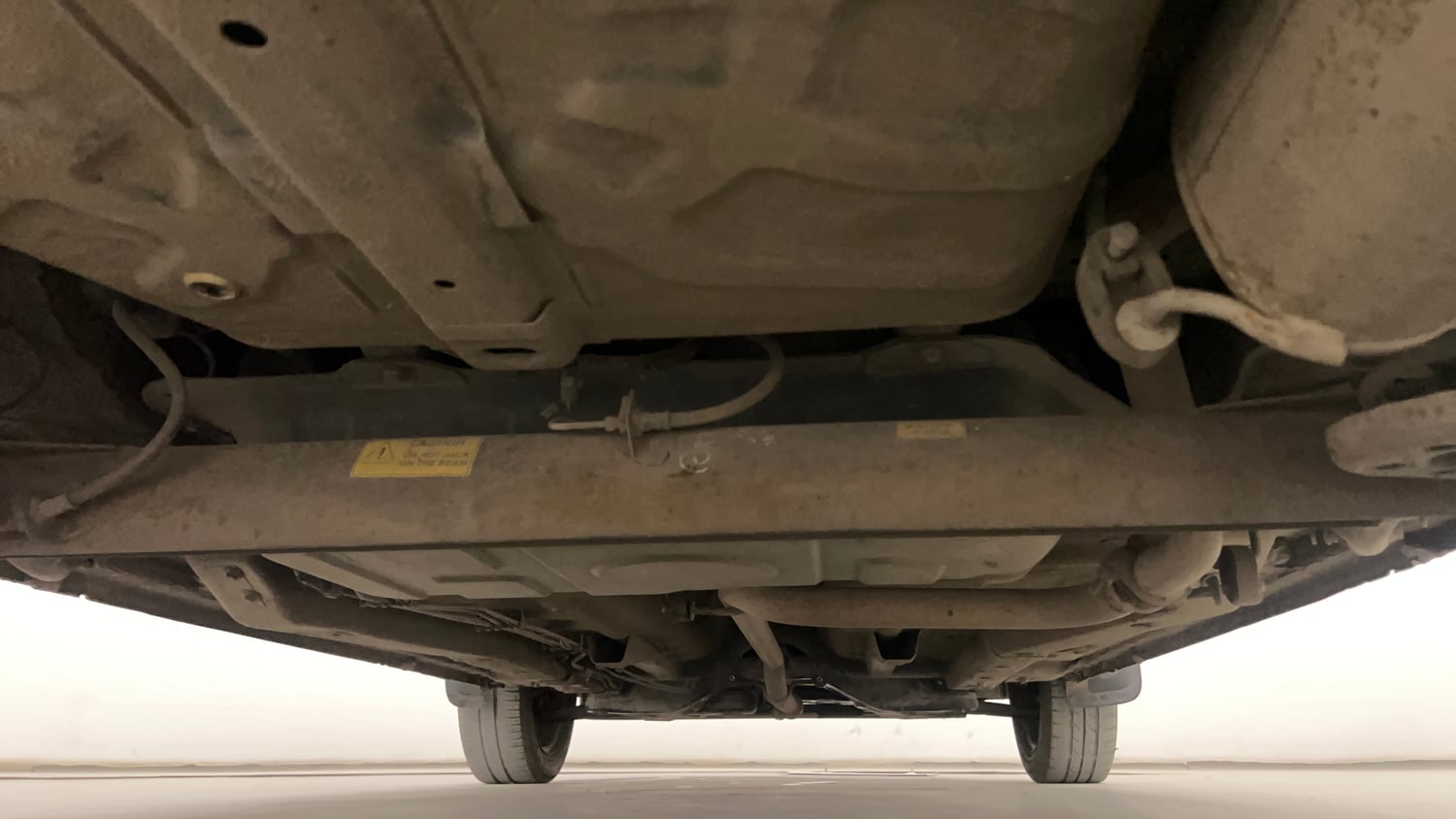 Used 2015 Tata Zest XMS Petrol Petrol Manual extra REAR UNDERBODY VIEW (TAKEN FROM REAR)