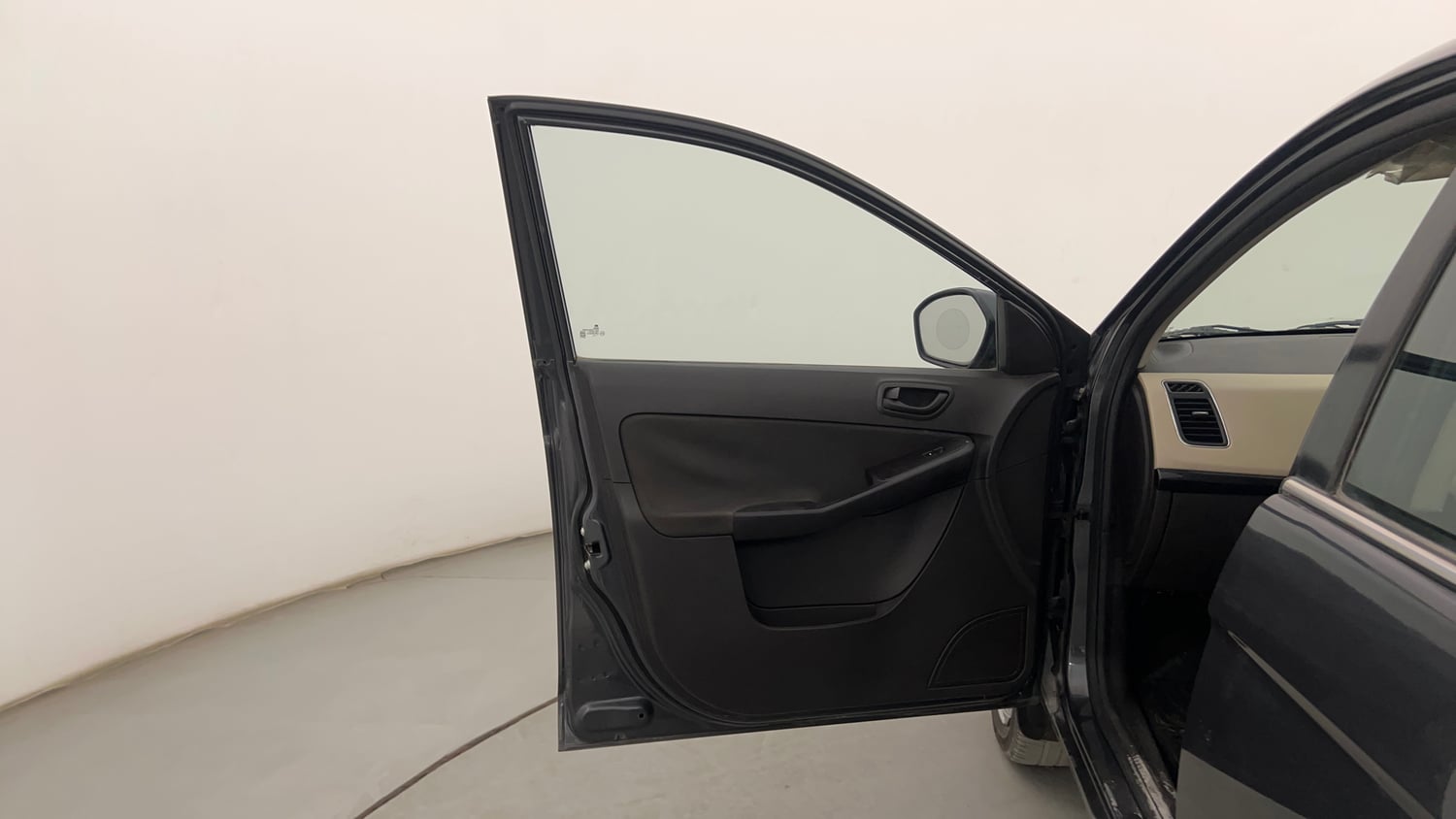 Used 2015 Tata Zest XMS Petrol Petrol Manual interior LEFT FRONT DOOR OPEN VIEW