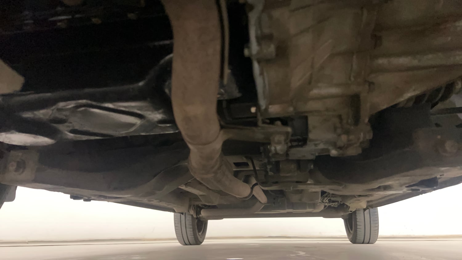 Used 2015 Tata Zest XMS Petrol Petrol Manual extra FRONT LEFT UNDERBODY VIEW