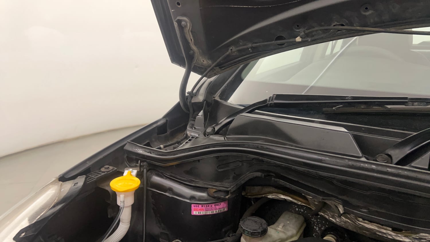 Used 2015 Tata Zest XMS Petrol Petrol Manual engine ENGINE RIGHT SIDE HINGE & APRON VIEW