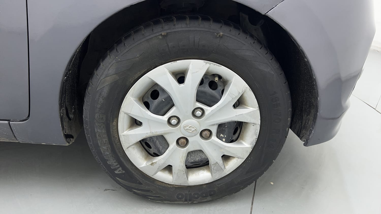 Used 2014 Hyundai Grand i10 Magna 1.2 Kappa VTVT Petrol Manual tyres RIGHT FRONT TYRE RIM VIEW