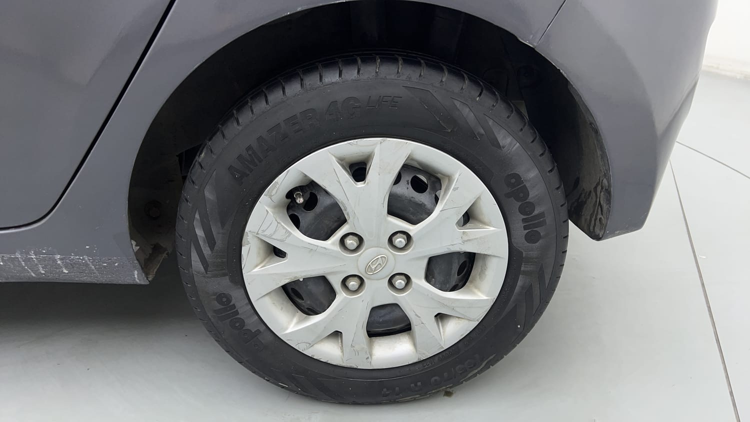 Used 2014 Hyundai Grand i10 Magna 1.2 Kappa VTVT Petrol Manual tyres LEFT REAR TYRE RIM VIEW