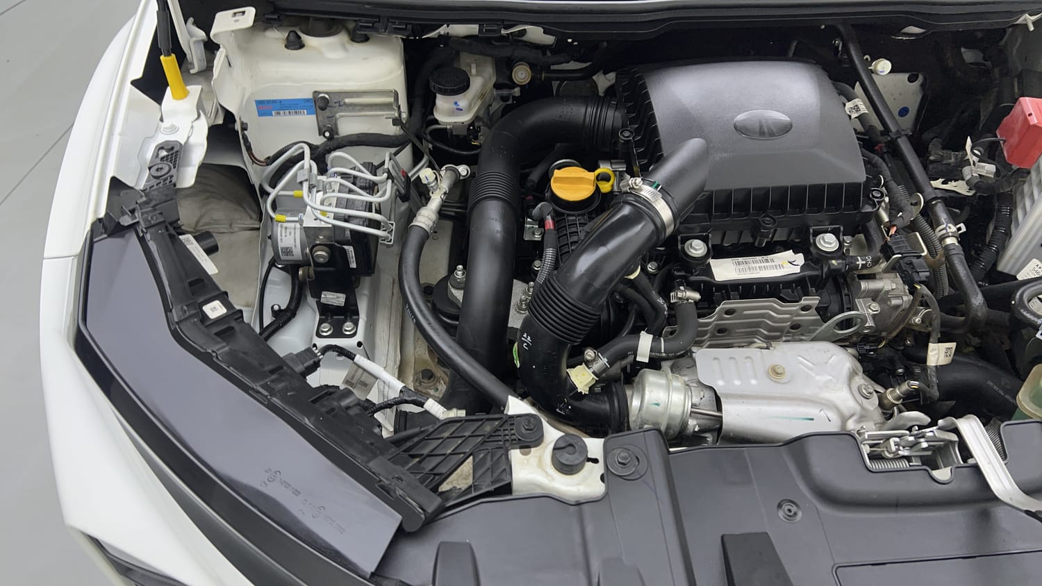 Used 2025 Tata Nexon Creative Plus (PS) 1.2 Petrol DCA Dual Tone Petrol Automatic engine ENGINE RIGHT SIDE VIEW