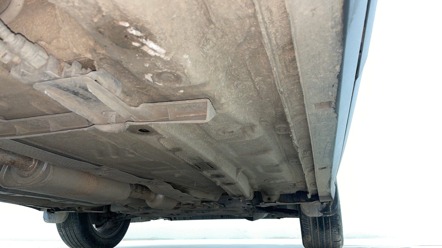 Used 2022 Volkswagen Taigun Topline 1.0 TSI MT Petrol Manual extra REAR RIGHT UNDERBODY VIEW