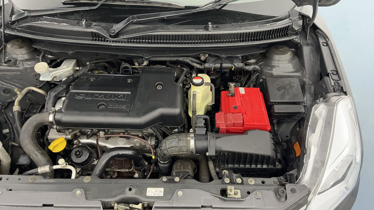 Used 2017 Maruti Suzuki Baleno Zeta 1.3 Diesel Manual engine ENGINE LEFT SIDE VIEW