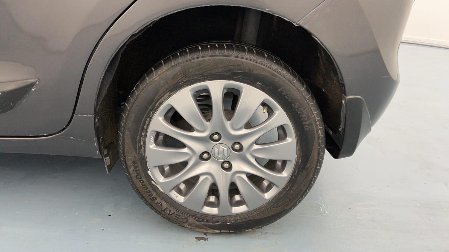 Used 2017 Maruti Suzuki Baleno Zeta 1.3 Diesel Manual tyres LEFT REAR TYRE RIM VIEW