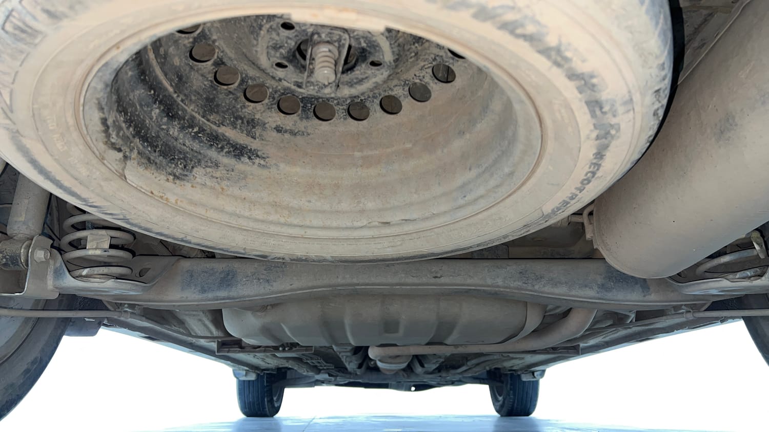 Used 2022 Kia Carens Prestige Plus 1.4 Petrol MT 7 STR Petrol Manual extra REAR UNDERBODY VIEW (TAKEN FROM REAR)