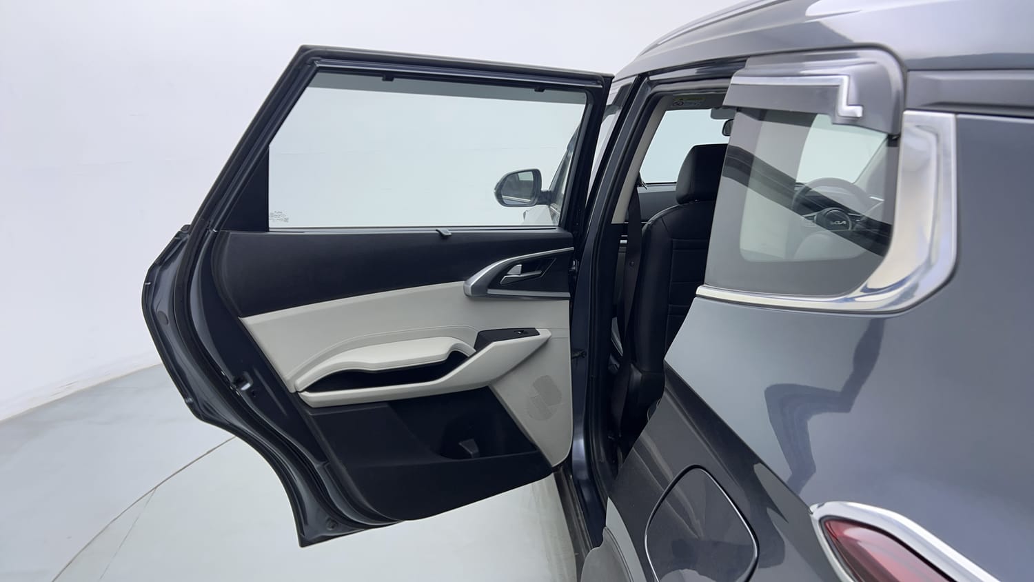 Used 2022 Kia Carens Prestige Plus 1.4 Petrol MT 7 STR Petrol Manual interior LEFT REAR DOOR OPEN VIEW
