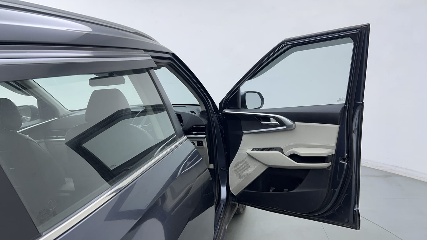 Used 2022 Kia Carens Prestige Plus 1.4 Petrol MT 7 STR Petrol Manual interior RIGHT FRONT DOOR OPEN VIEW