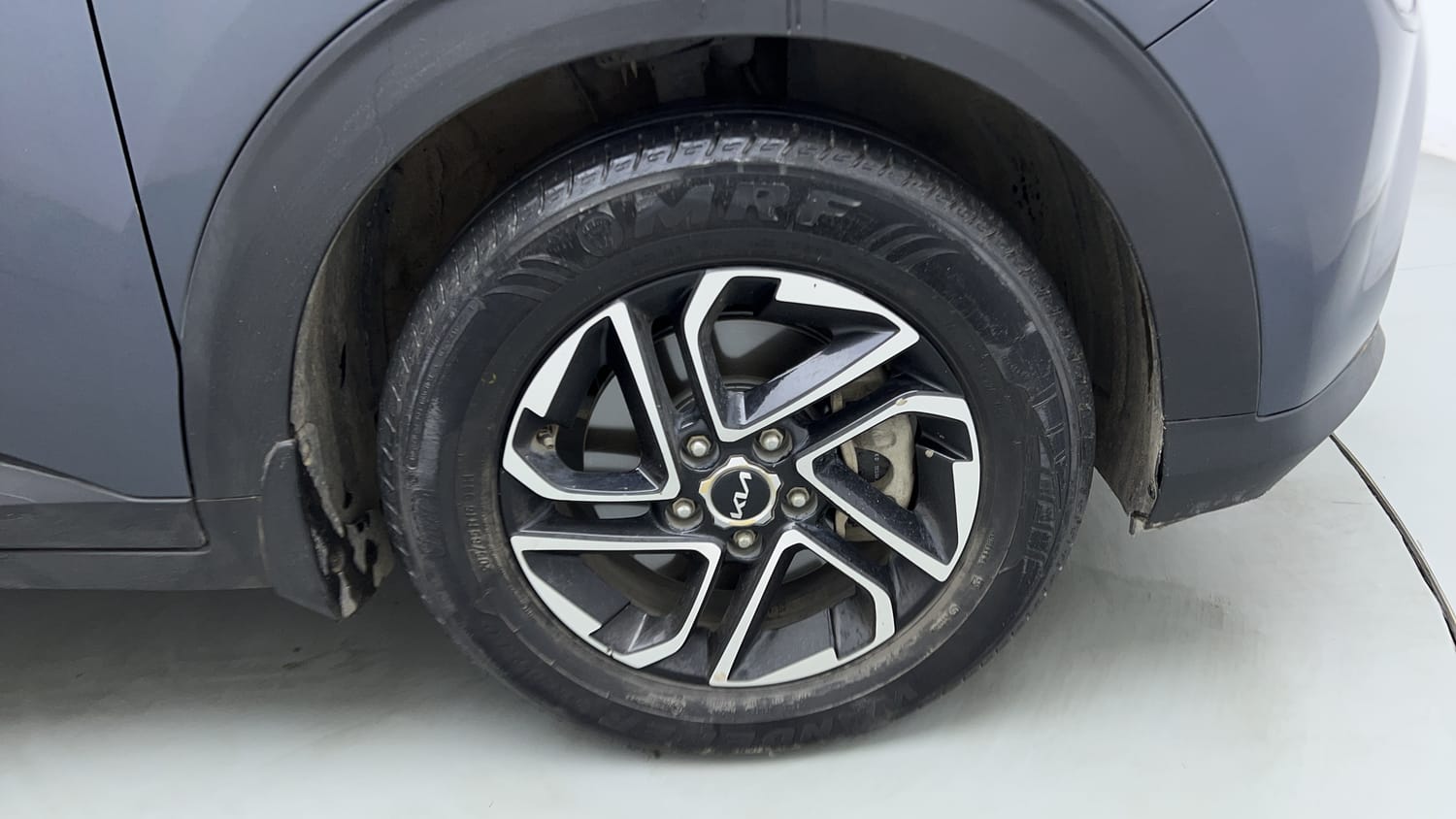 Used 2022 Kia Carens Prestige Plus 1.4 Petrol MT 7 STR Petrol Manual tyres RIGHT FRONT TYRE RIM VIEW