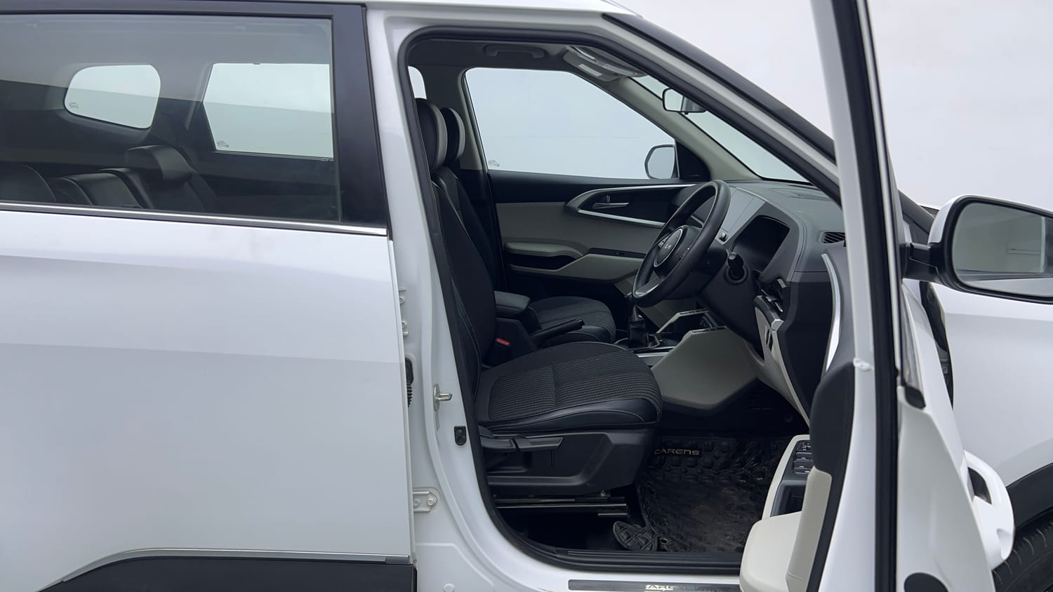 Used 2022 Kia Carens Prestige Plus 1.4 Petrol MT 7 STR Petrol Manual interior RIGHT SIDE FRONT DOOR CABIN VIEW