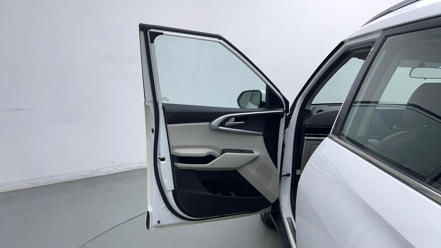 Used 2022 Kia Carens Prestige Plus 1.4 Petrol MT 7 STR Petrol Manual interior LEFT FRONT DOOR OPEN VIEW