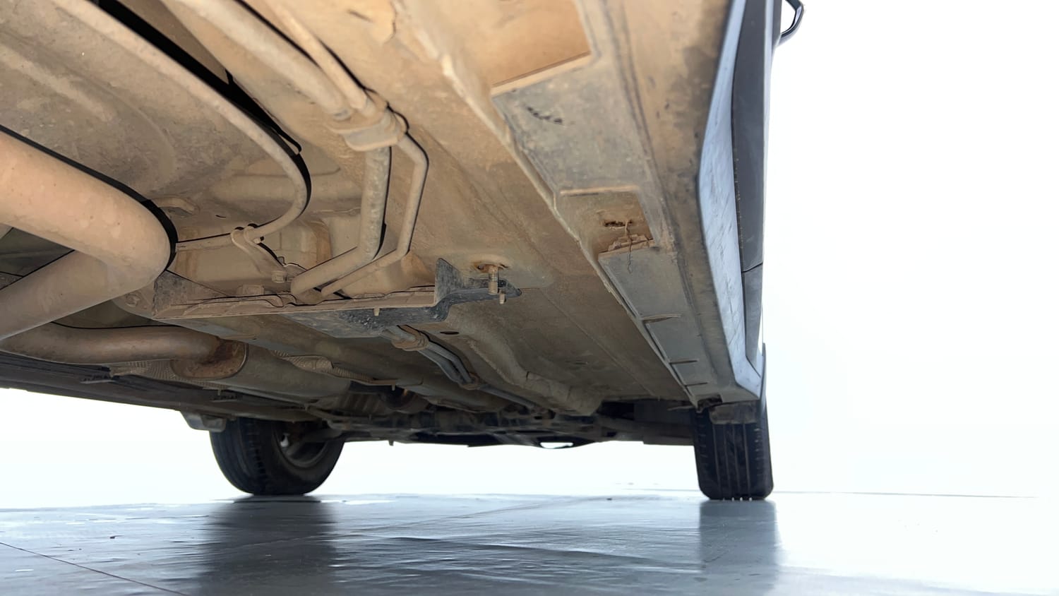 Used 2022 Kia Carens Prestige Plus 1.4 Petrol MT 7 STR Petrol Manual extra REAR RIGHT UNDERBODY VIEW