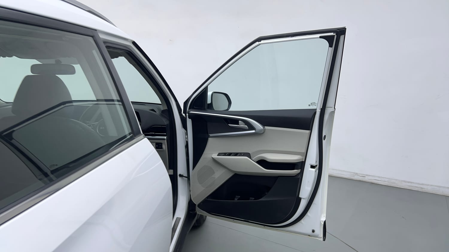 Used 2022 Kia Carens Prestige Plus 1.4 Petrol MT 7 STR Petrol Manual interior RIGHT FRONT DOOR OPEN VIEW