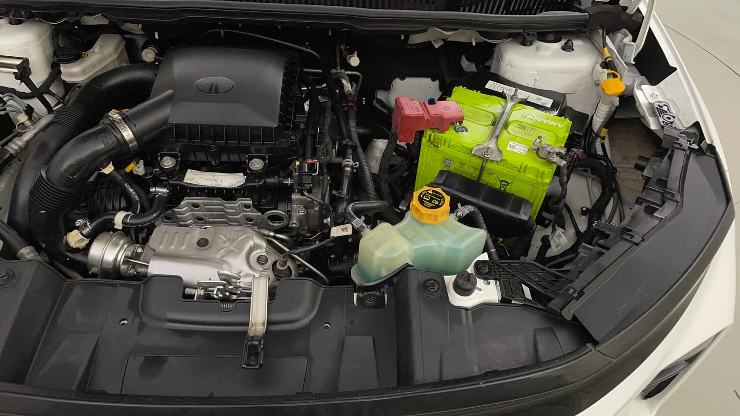 Used 2024 Tata Nexon Creative Plus 1.2 Revotron Petrol 7DCA Petrol Automatic engine ENGINE LEFT SIDE VIEW