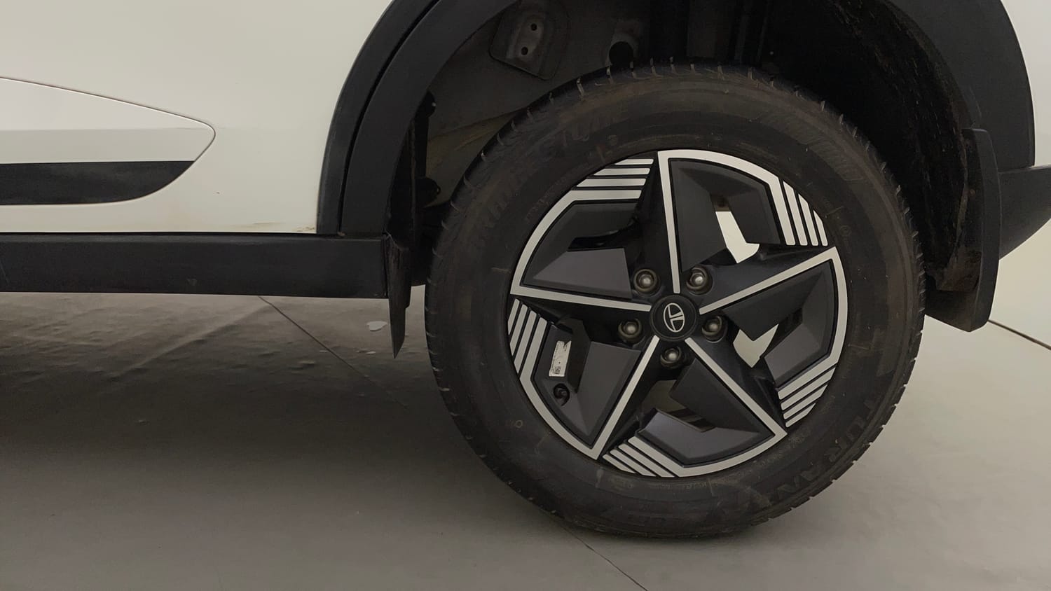 Used 2024 Tata Nexon Creative Plus 1.2 Revotron Petrol 7DCA Petrol Automatic tyres LEFT REAR TYRE RIM VIEW