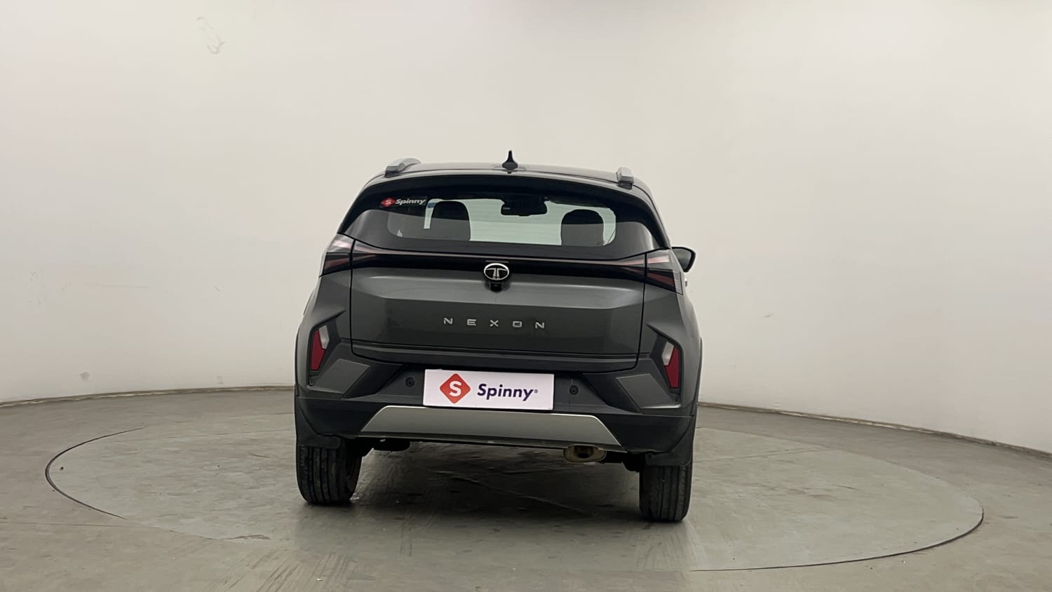 Used 2024 Tata Nexon Fearless Plus S 1.2 Revotron Petrol 7DCA DT Petrol Automatic exterior BACK VIEW