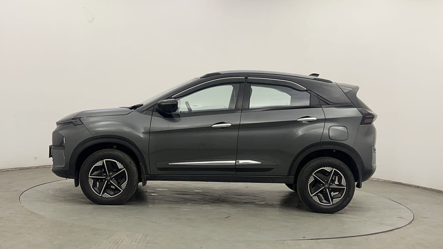 Used 2024 Tata Nexon Fearless Plus S 1.2 Revotron Petrol 7DCA DT Petrol Automatic exterior LEFT SIDE VIEW